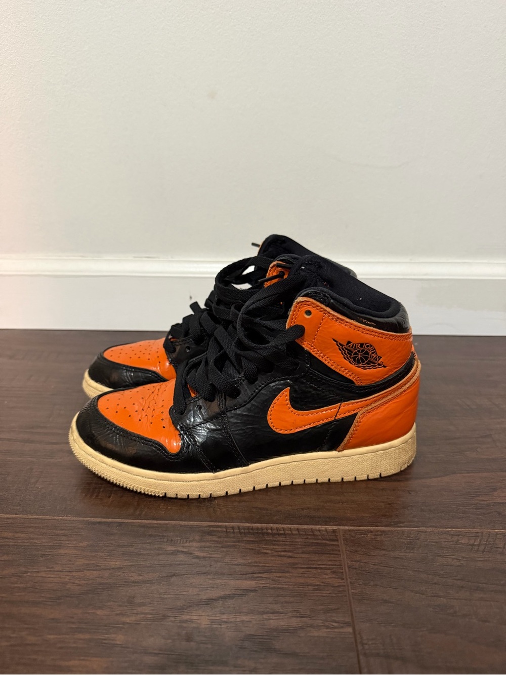 Jordan Kids High-Top Sneakers in Black and Orange